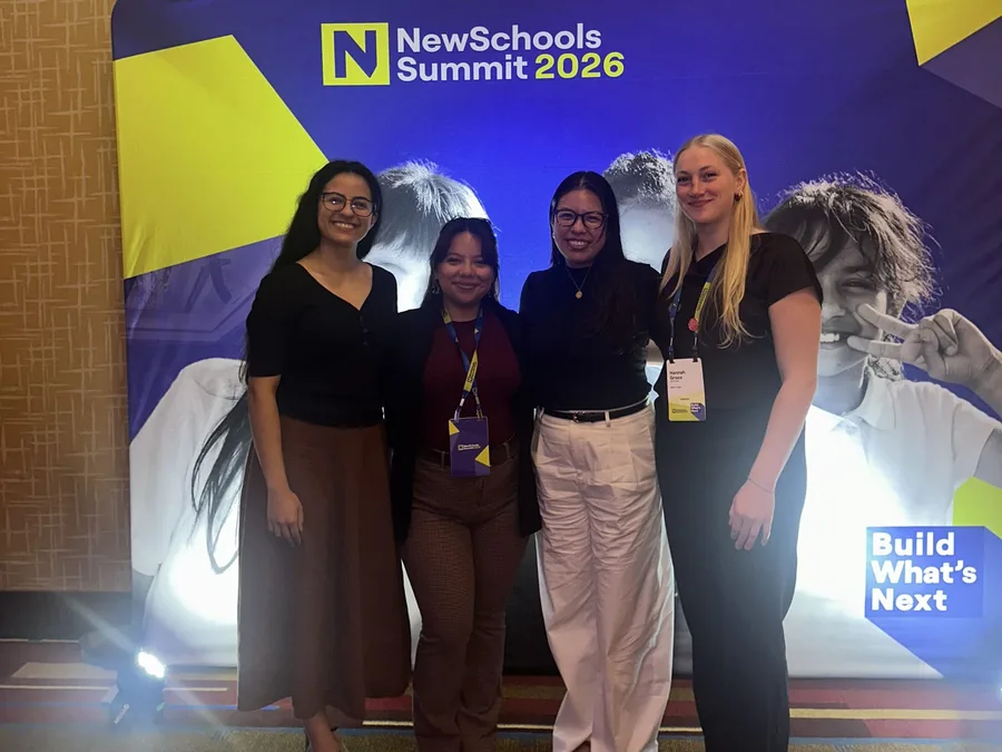 Marisol and three colleagues from The Rithm Project, including Hannah Groos, smiling in front of the NewSchools Summit 2026 backdrop.