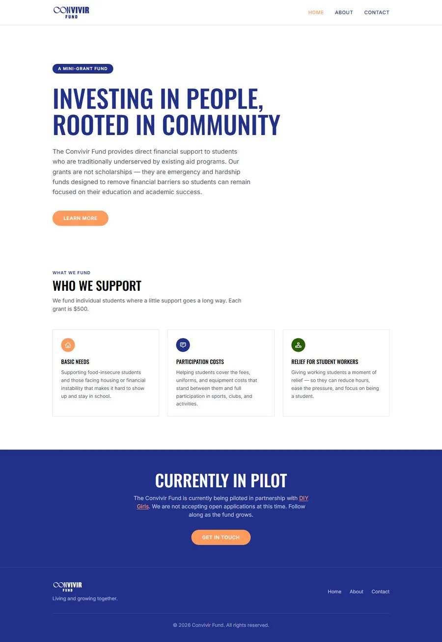 Full homepage with navy and orange palette and blue wordmark.